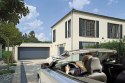 Brama garażowa segmentowa Renomatic/Hormann z napędem Supramatic E i szyną FS10-K - przetłoczenia M Decocolor. Wymiar 5000x2250m